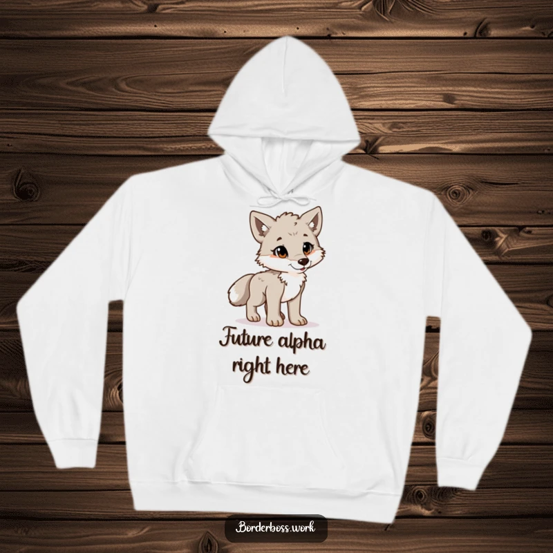 A playful wolf cub standing at attention with a proud, confident posture, humorously depicted on this cozy hoodie.